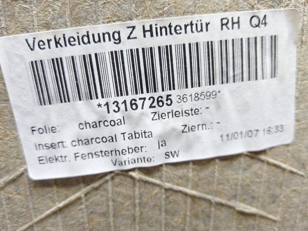 Обшивка двери задней правой (дверная карта) 1WFOBD Opel Astra купить на авторазборке