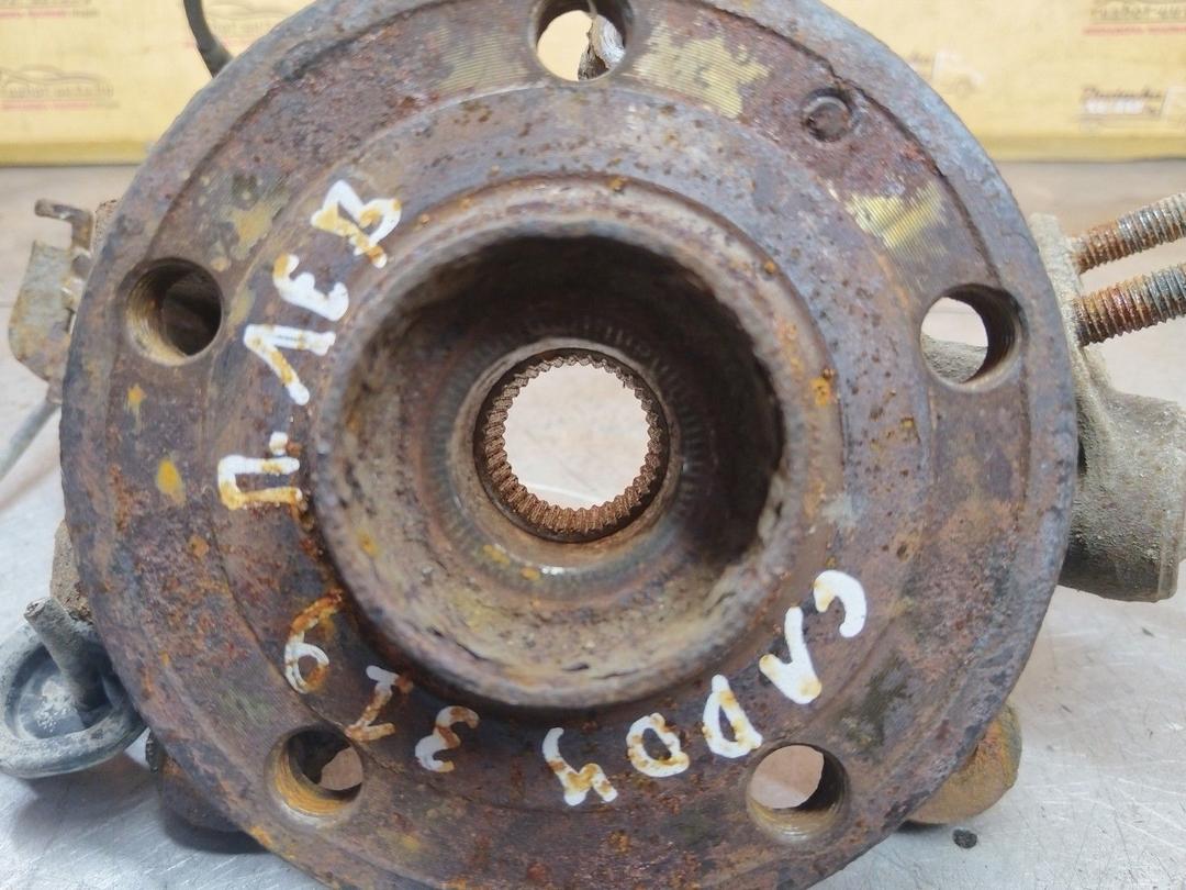 Кулак поворотный левый MV7U5X Volkswagen Caddy купить