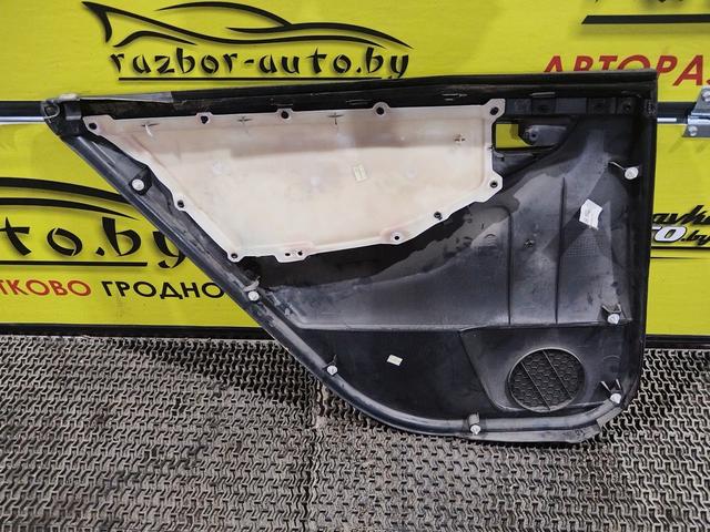 Обшивка двери задней правой (дверная карта) I56VG7 Toyota Corolla купить