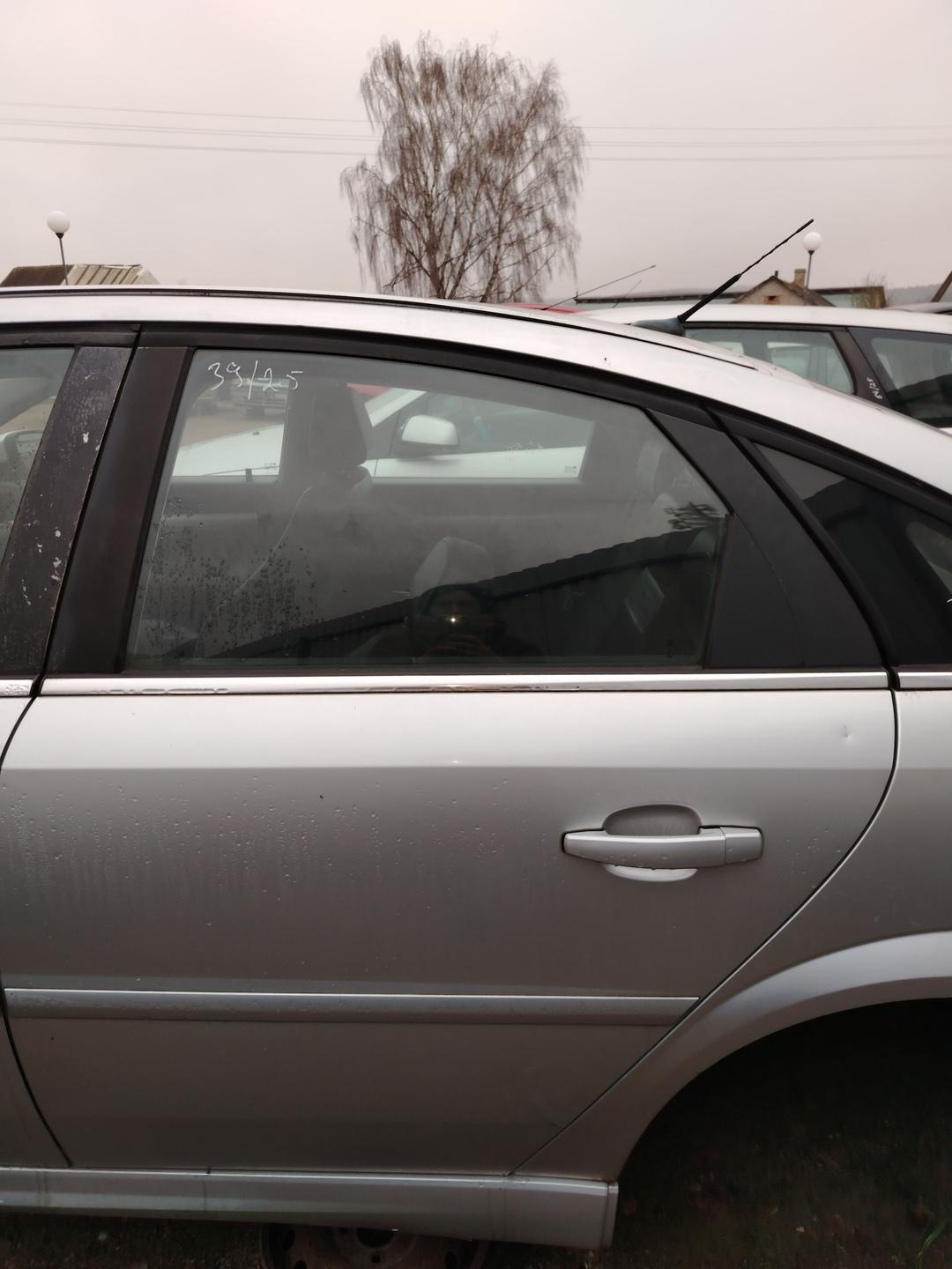 Замок двери задней левой 9BH2BU Opel Vectra