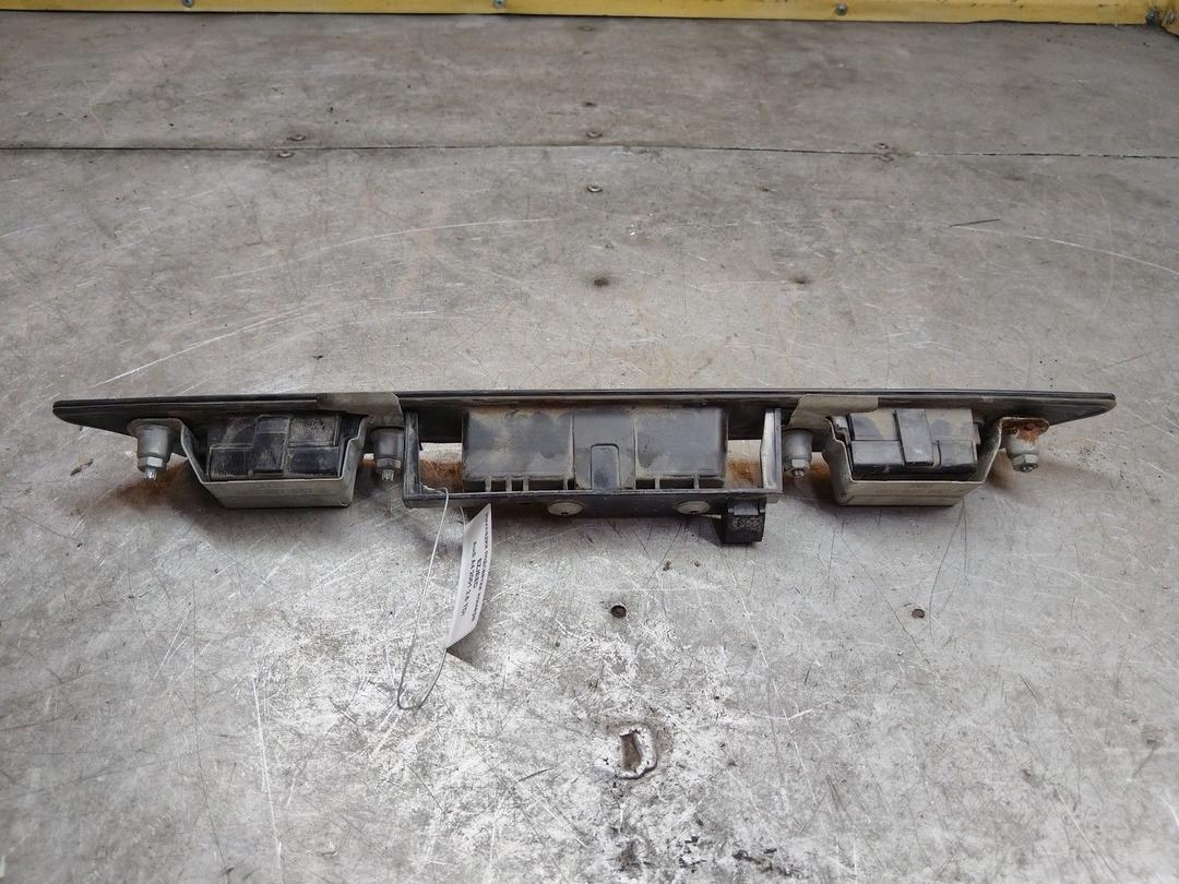 Накладка подсветки номера EZJEED Audi A4 купить в магазине запчастей бу