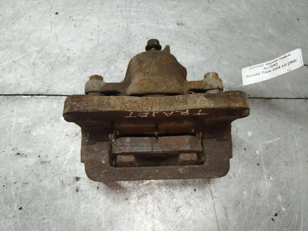 Суппорт задний левый AL1GRD Hyundai Trajet купить на авторазборке