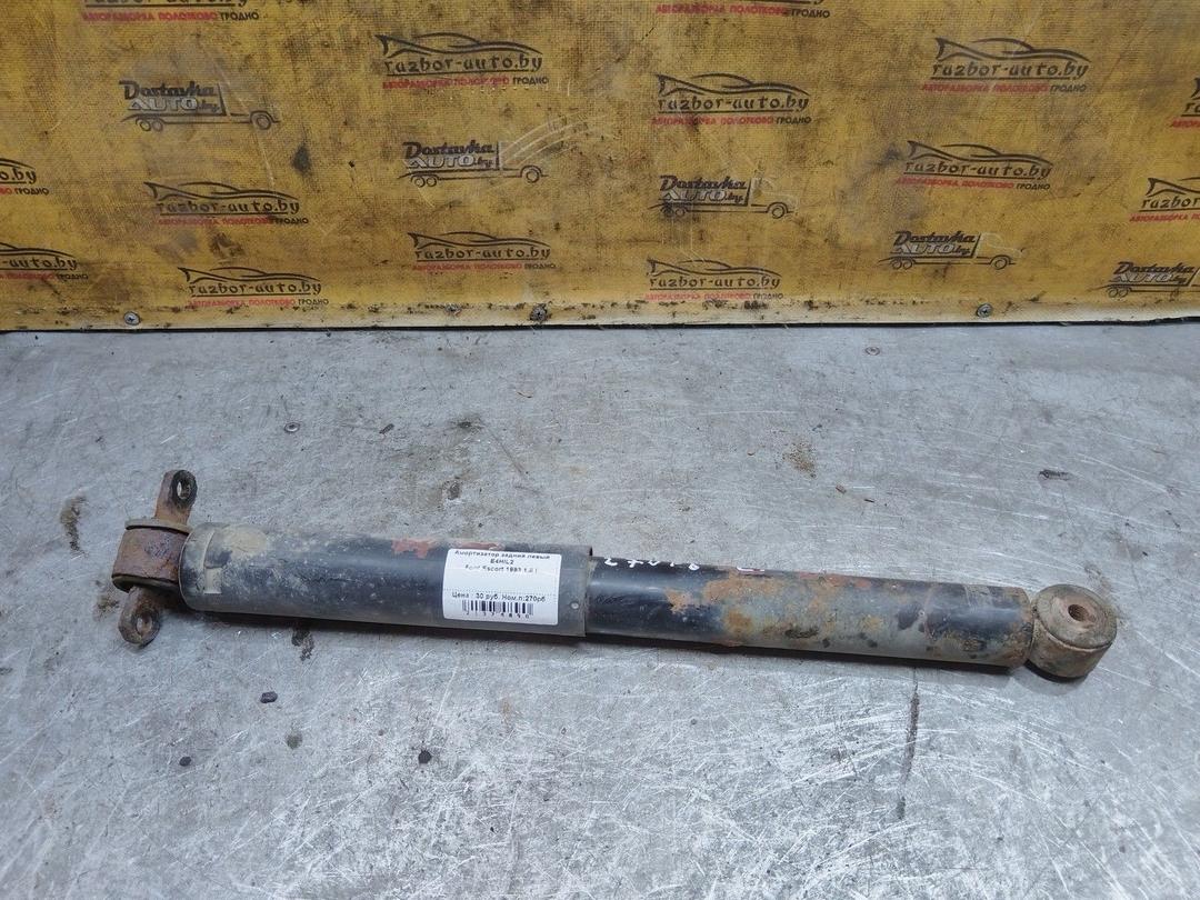 Амортизатор задний левый E4HIL2 Ford Escort