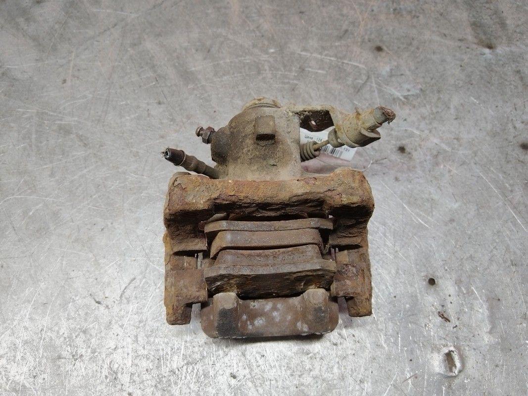 Суппорт задний правый F9UO3M Audi A3 купить в магазине запчастей бу