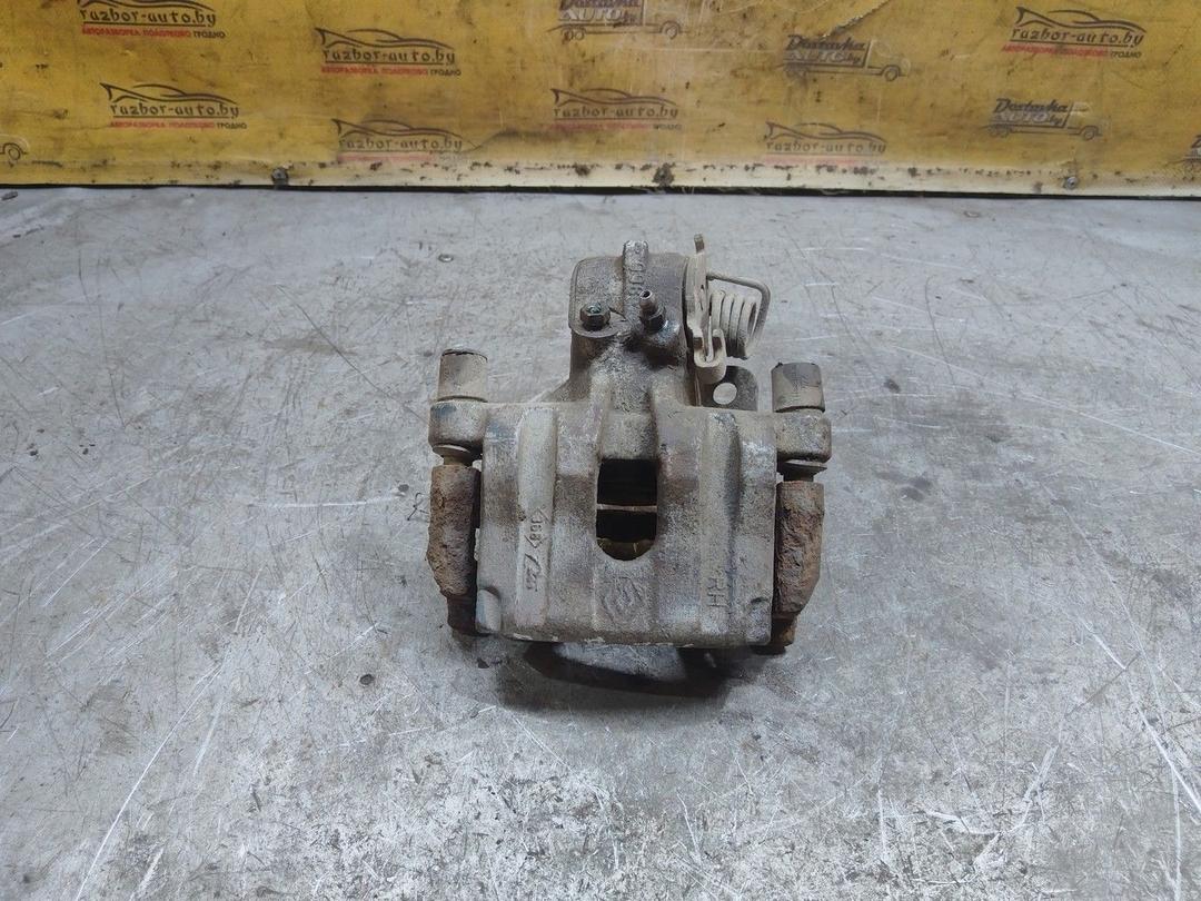 Суппорт задний правый UU49CP Renault Laguna - Фото 1