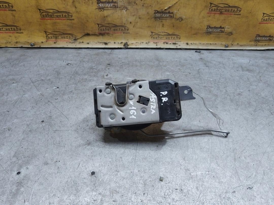 Замок двери передней правой C69G49 Opel Astra купить в магазине запчастей бу