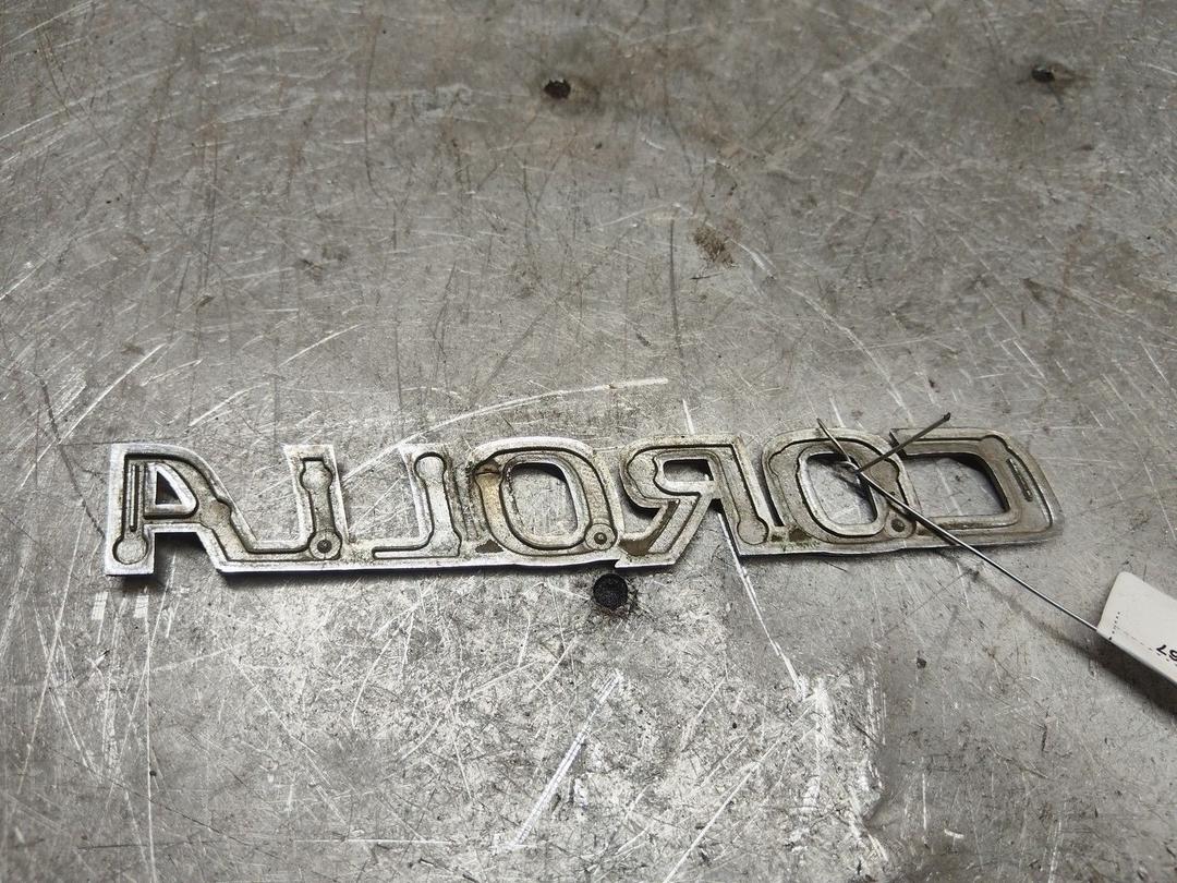 Эмблема 0UGLOY Toyota Corolla - Фото 2