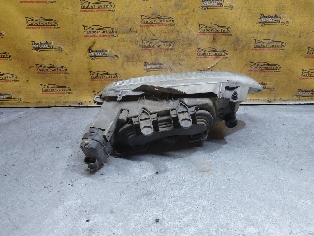 Фара левая X02R4A Renault Espace купить в магазине запчастей бу