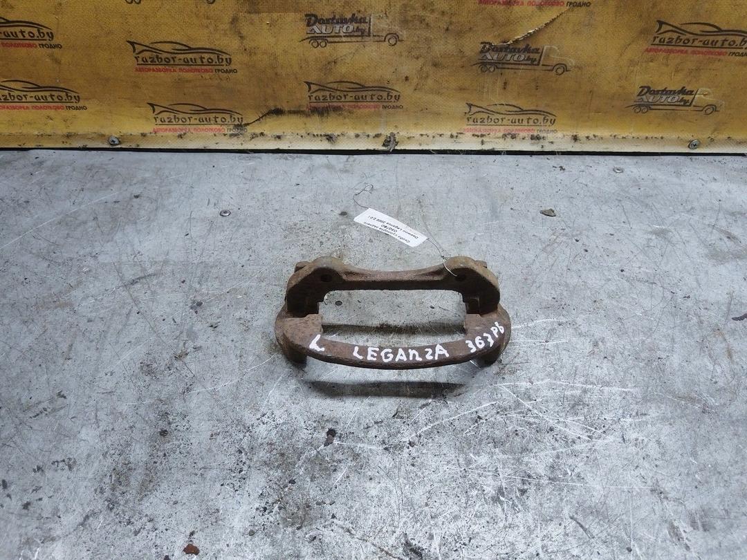 Скоба суппорта заднего O3Q7BO Daewoo Leganza