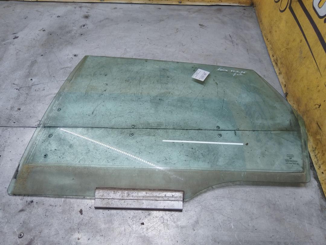 Стекло двери задней левой K053JP Opel Astra купить