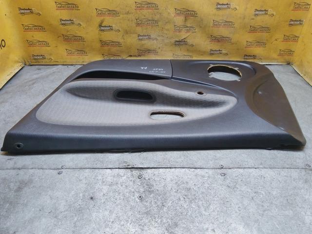 Обшивка двери передней правой (дверная карта) 76Q40G Mitsubishi Carisma купить в магазине запчастей бу