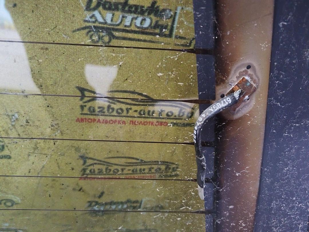 Стекло заднее UIDA28 Chrysler Voyager купить на авторазборке