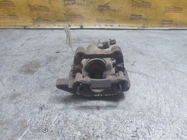 Суппорт задний правый T48DML Volkswagen Jetta купить в магазине запчастей бу