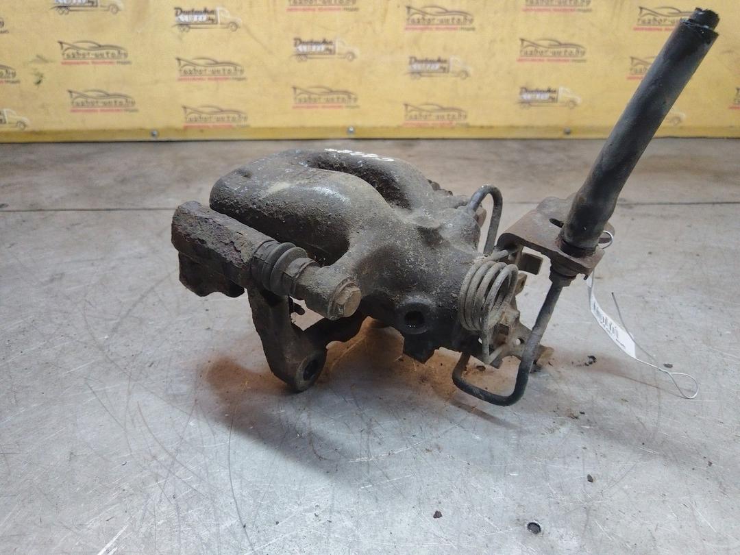 Суппорт задний левый Z9MVWU Volkswagen Caddy купить