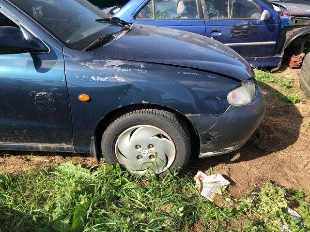 Амортизатор передний правый IQH7K1 Hyundai Lantra купить