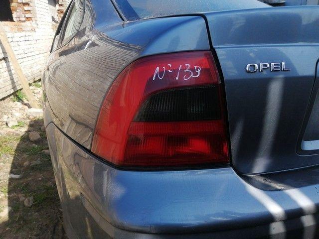 Фонарь задний левый W0670U Opel Vectra