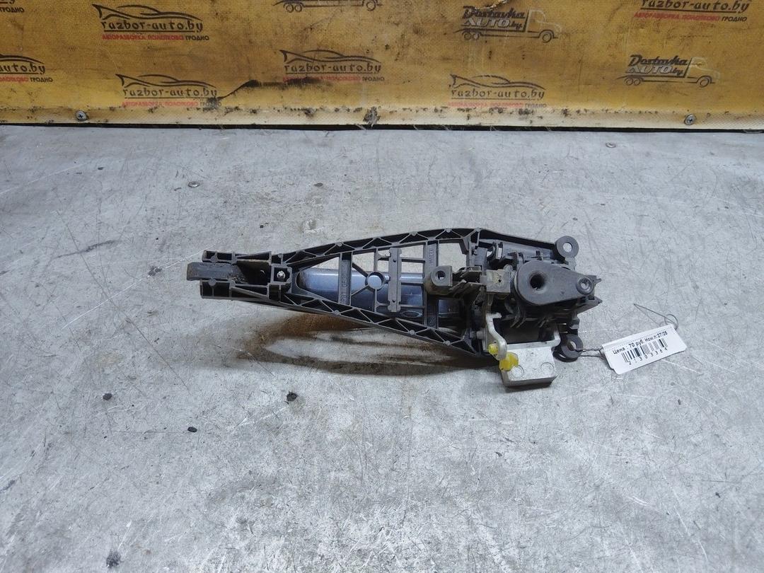 Ручка наружная передняя левая QLVTW4 Opel Astra купить в магазине запчастей бу