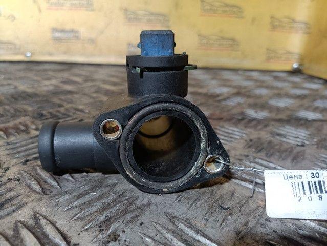 Фланец (тройник) системы охлаждения 04C5R2 Audi 80 купить в магазине запчастей бу