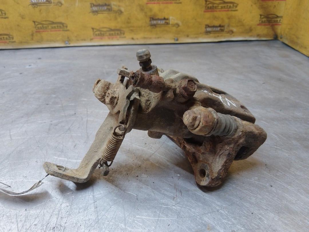 Суппорт задний правый 4T446U Nissan Almera купить в магазине запчастей бу