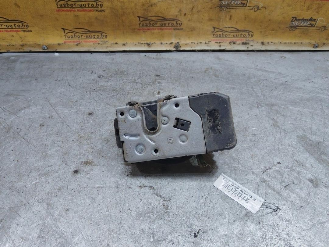 Замок двери передней правой 7OMW2G Opel Zafira