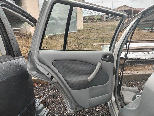 Обшивка двери задней левой (дверная карта) KQUL03 Skoda Octavia