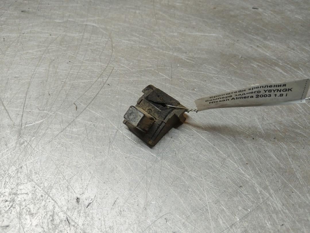 Кронштейн крепления бампера заднего E4B05Y Nissan Almera - Фото 1