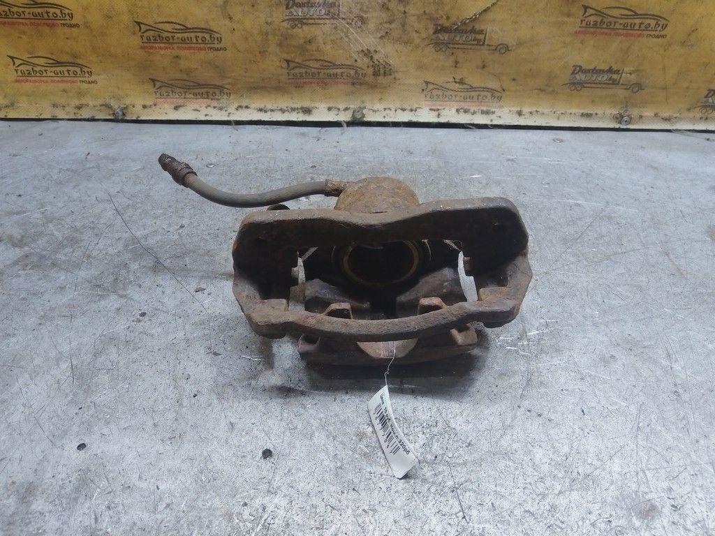 Суппорт передний левый P21G5W Mazda Xedos 6 - Фото 4