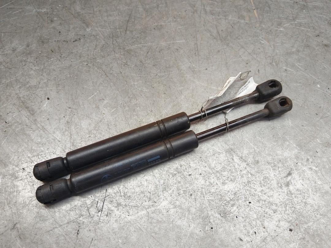 Амортизатор капота R23J5Q Opel Vectra