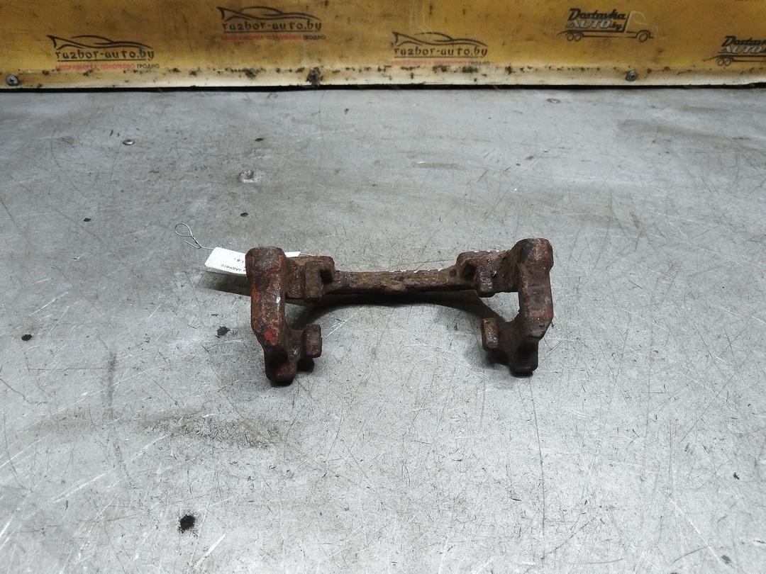 Скоба суппорта заднего W1DE97 Mazda 3 купить