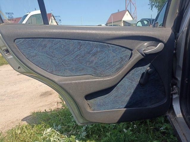 Обшивка двери задней левой (дверная карта) BPQ3CT Fiat Marea