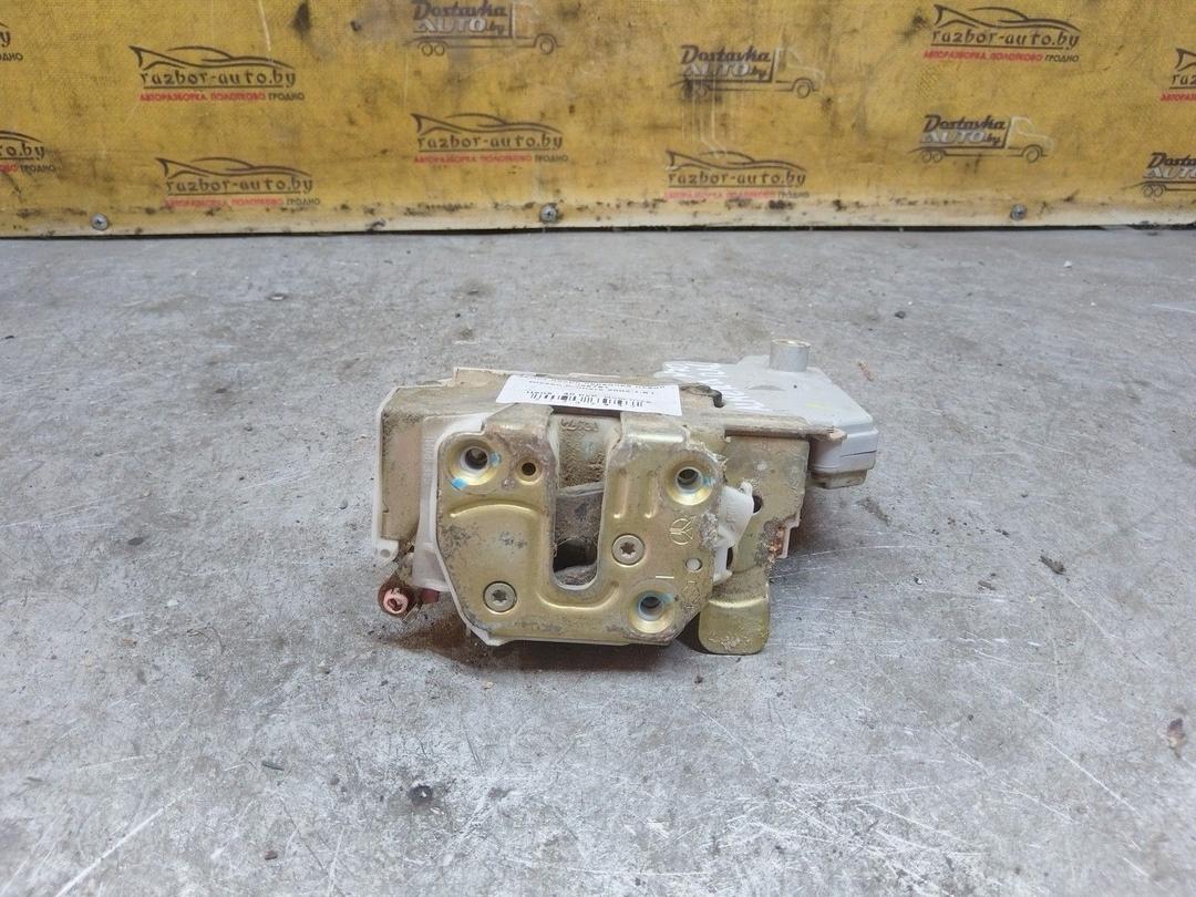 Замок двери передней левой J35791 Nissan Primera