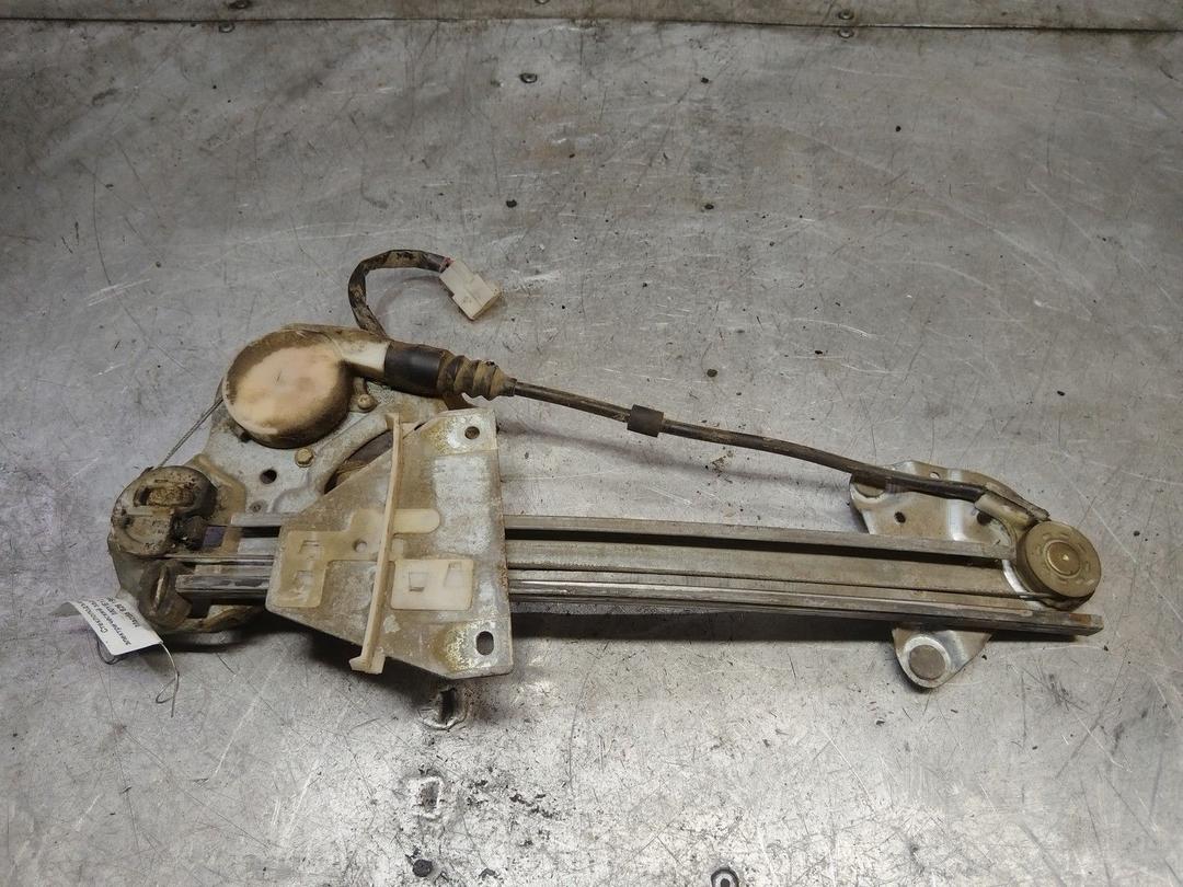 Стеклоподъемник электрический задний левый M0YE12 Mazda 626 - Фото 3