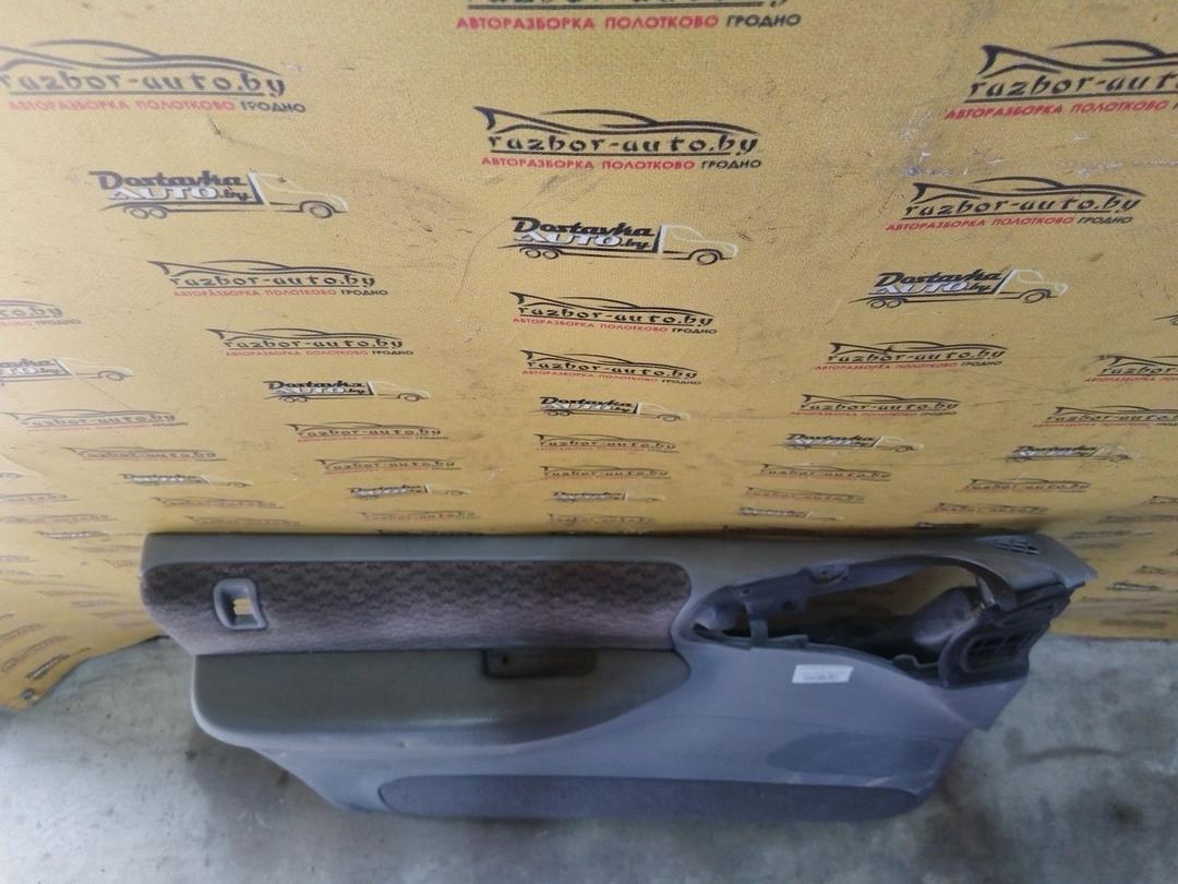 Обшивка двери передней левой (дверная карта) QYV73Y Chrysler Voyager купить с доставкой