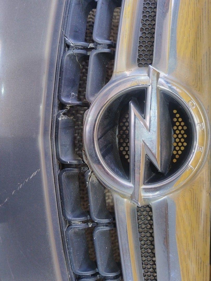 Бампер передний 65OFA7 Opel Corsa - Фото 11