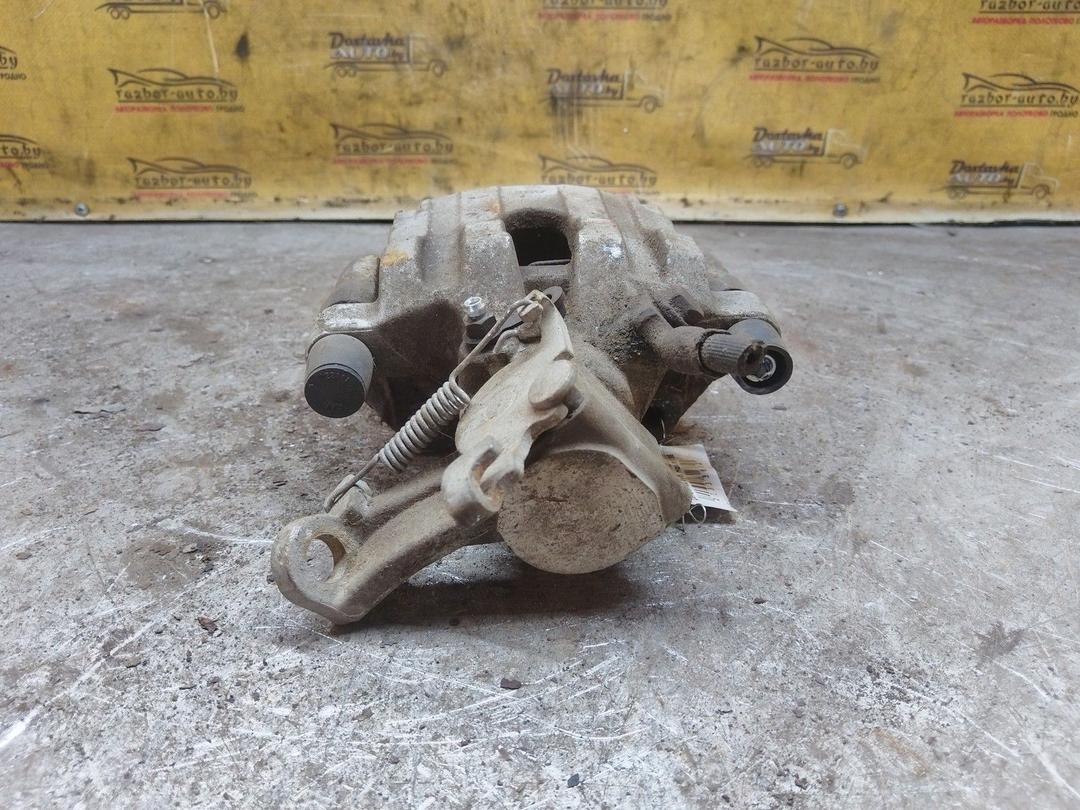 Суппорт задний правый 1NQNOQ Saab 9-3 купить