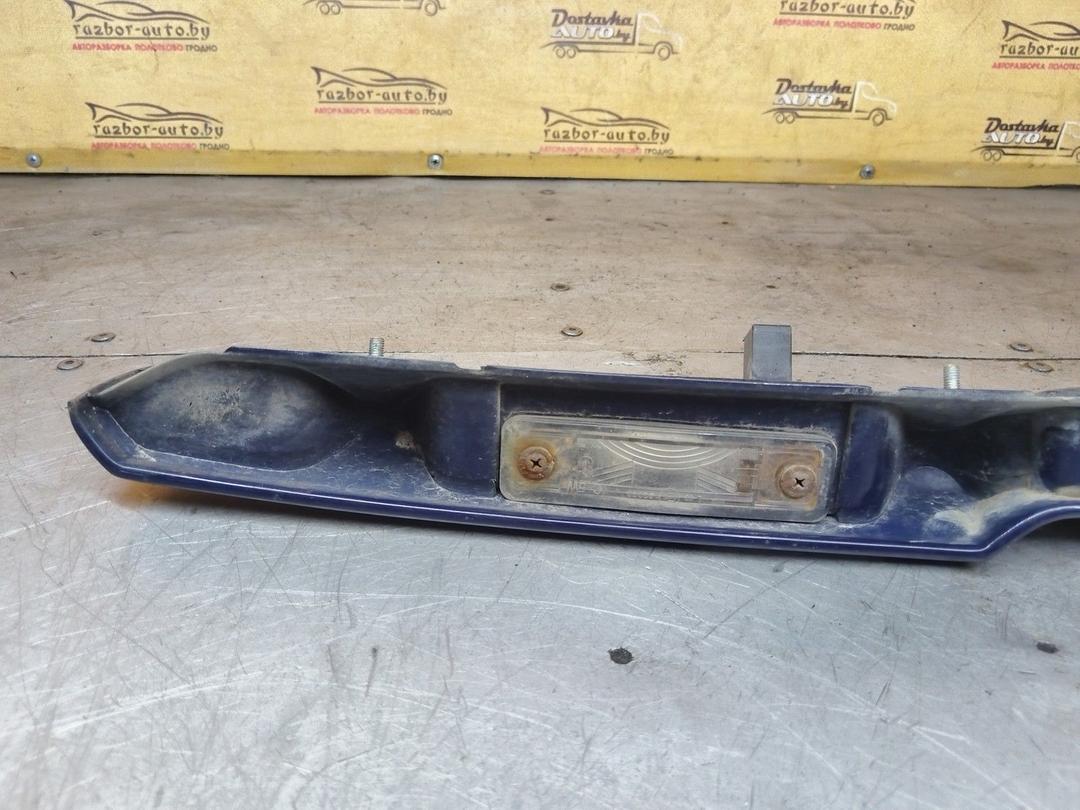 Накладка подсветки номера 49YR78 Opel Astra купить с доставкой