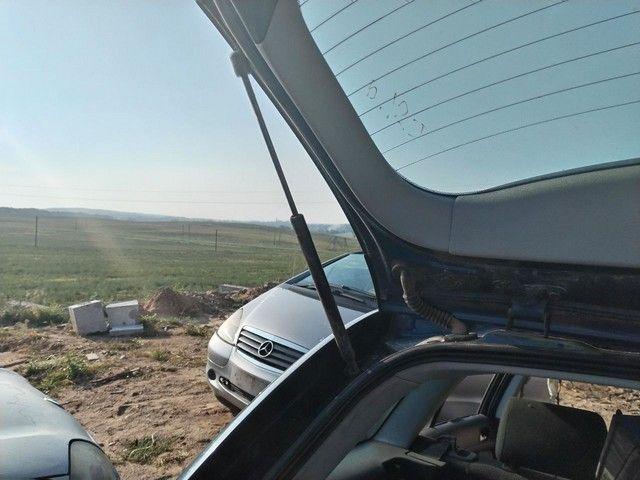 Амортизатор крышки багажника (3-5 двери) KH9XAY Toyota Avensis