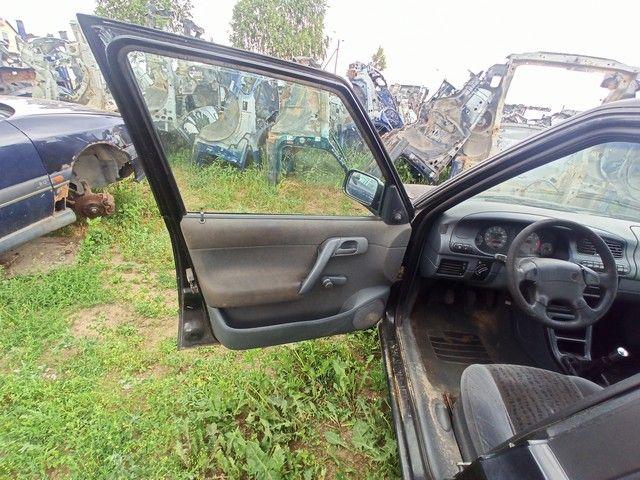 Обшивка двери передней левой (дверная карта) XO5FC7 Skoda Felicia купить