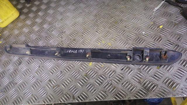 Накладка подсветки номера T1OYTD Toyota Corolla купить в магазине запчастей бу