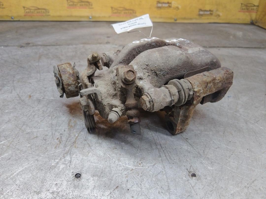 Суппорт задний левый 0W0TYV Opel Zafira купить с доставкой