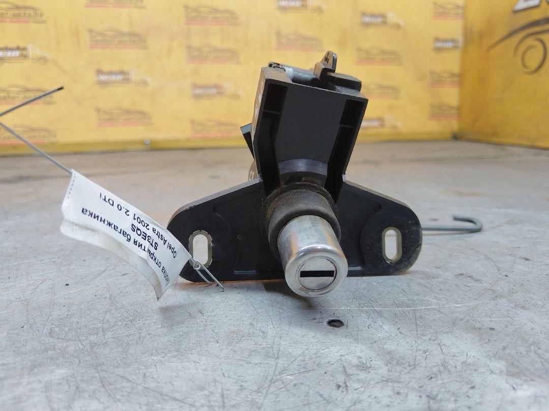 Кнопка открытия багажника ST3EQS Opel Astra - Фото 1