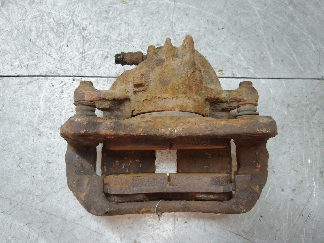 Суппорт передний левый O90OEM Mitsubishi Carisma купить на авторазборке