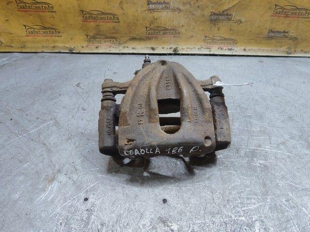 Суппорт передний правый AY9GI2 Toyota Corolla Verso купить