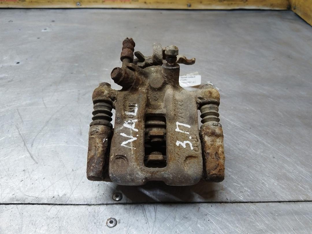 Суппорт задний правый 4T446U Nissan Almera