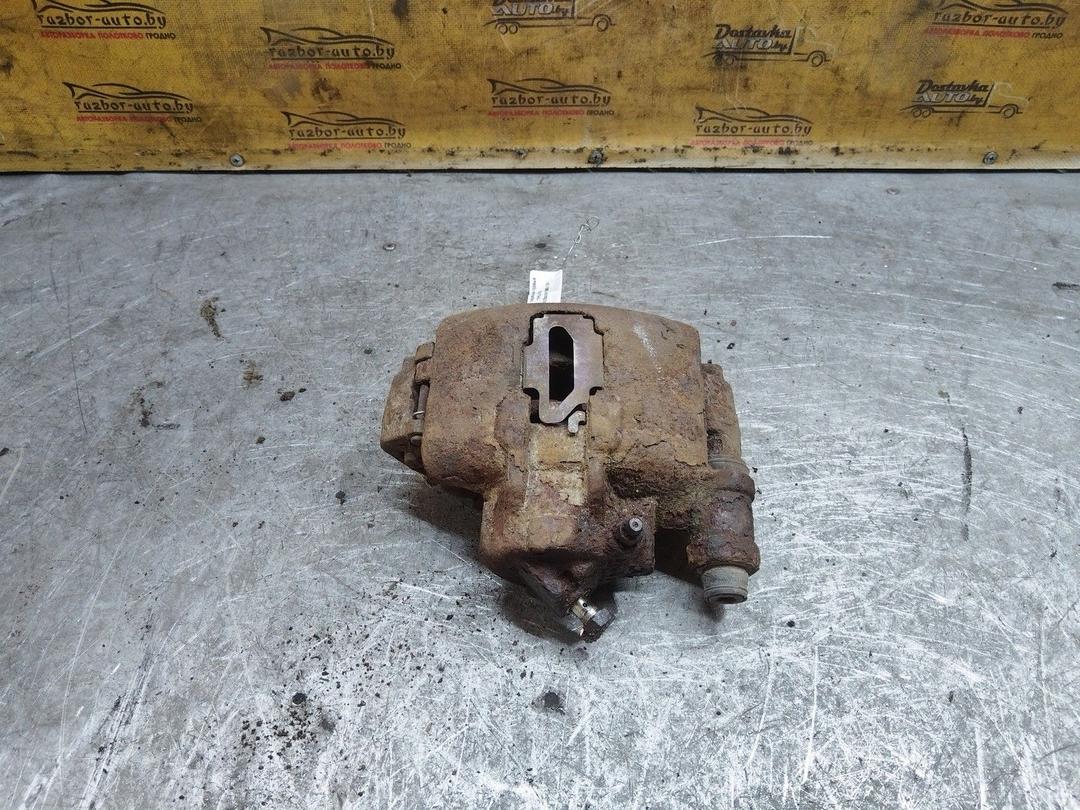 Суппорт передний правый YHL6UW Ford Escort