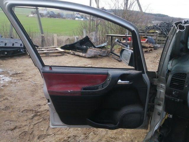 Обшивка двери передней левой (дверная карта) L8NRMO Opel Zafira