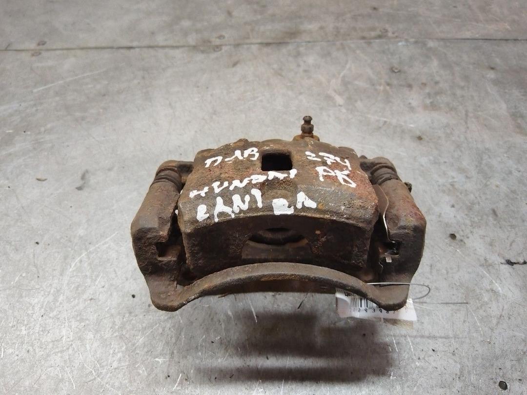 Суппорт передний левый JZNJ03 Hyundai Lantra - Фото 1