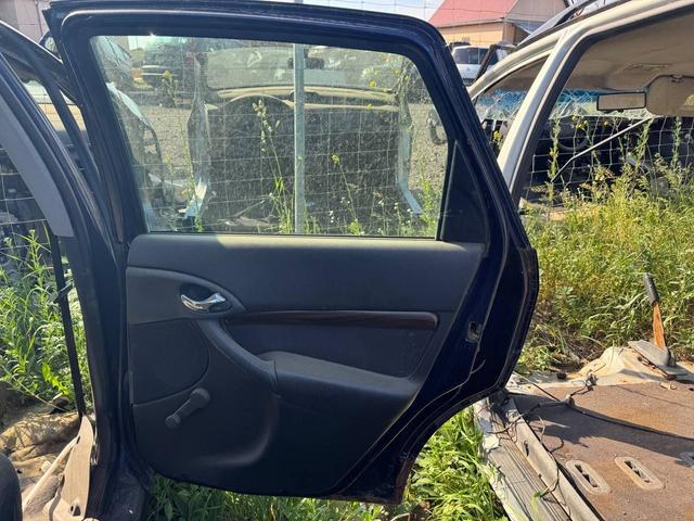 Обшивка двери задней правой (дверная карта) 048K1L Ford Focus
