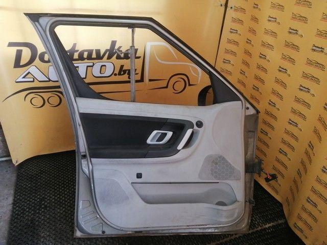 Обшивка двери передней левой (дверная карта) MTPZW2 Skoda Roomster - Фото 1