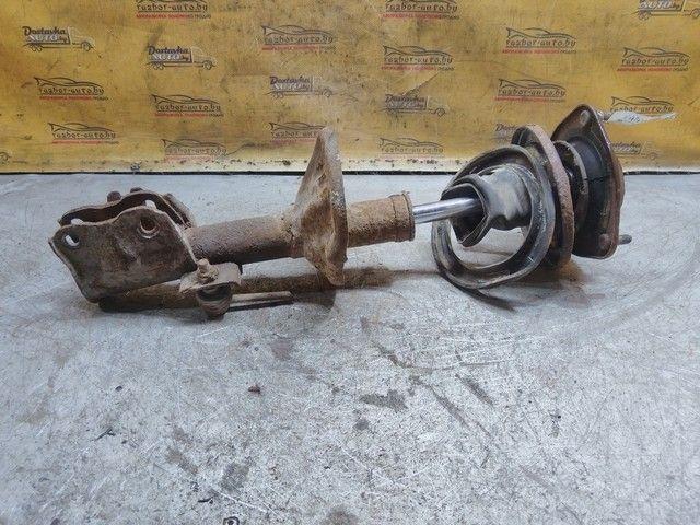 Амортизатор передний левый WO9PR0 Mitsubishi Carisma купить на авторазборке